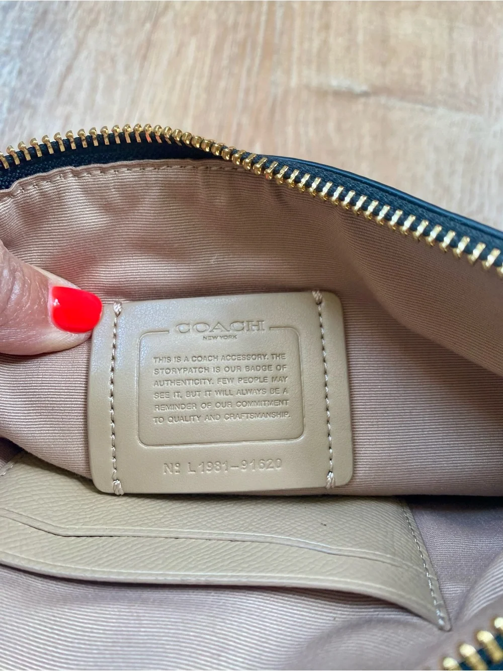 Coach Cream and Black Zip Wristlet